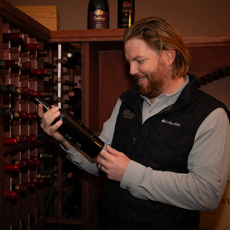 Winemaker Michael Baldacci holding a 2016 Brenda’s Vineyard Cabernet Sauvignon during the Winemaker's Collection Cabernet Tasting at Baldacci Family Vineyards.